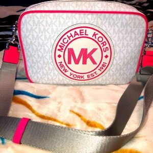 Brand new MK crossbody Bag. White & Neon